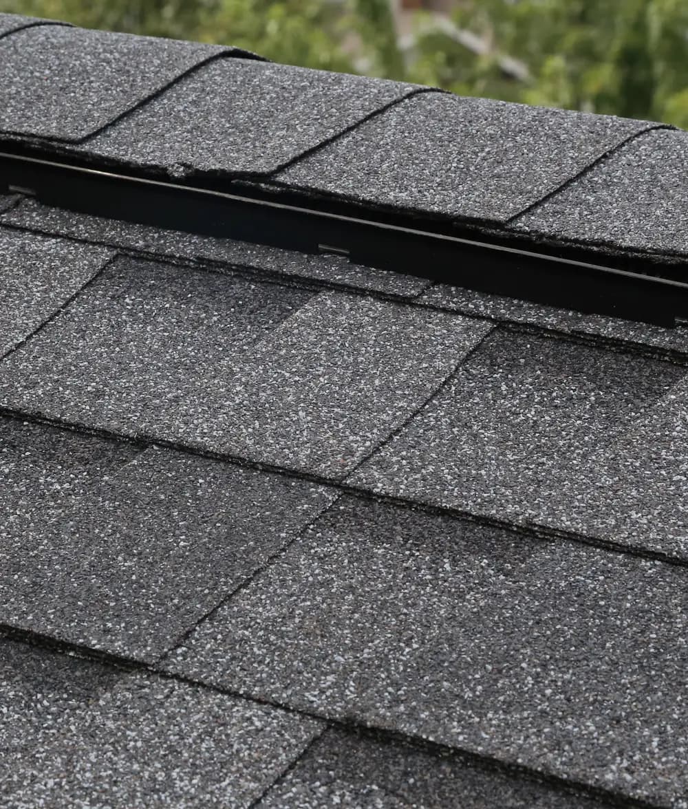 Close-up of architectural shingles at the ridge