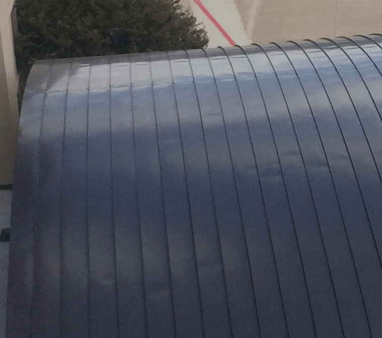 Addressing Oil Canning on Metal Roofs-min